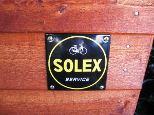 Solex service, skilt ved værksted dør.